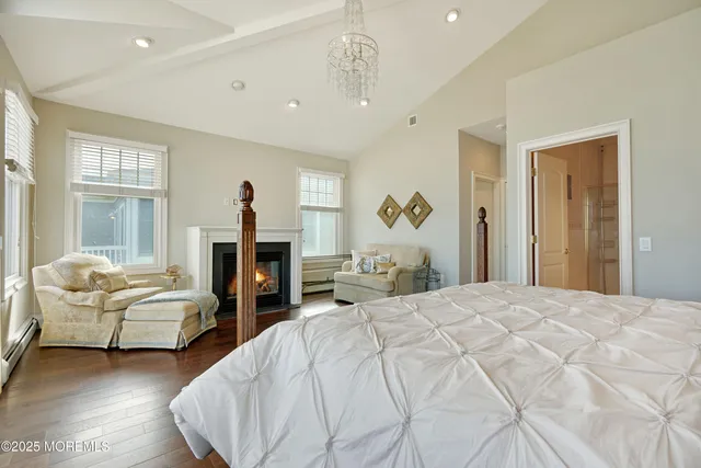 a bedroom with two beds and a couch