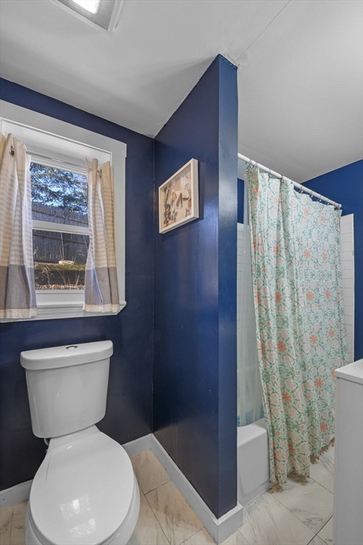 10 Stoddard Terrace Lynn, MA 01902 - Photo 11 of 40 a bathroom with a toilet sink and shower