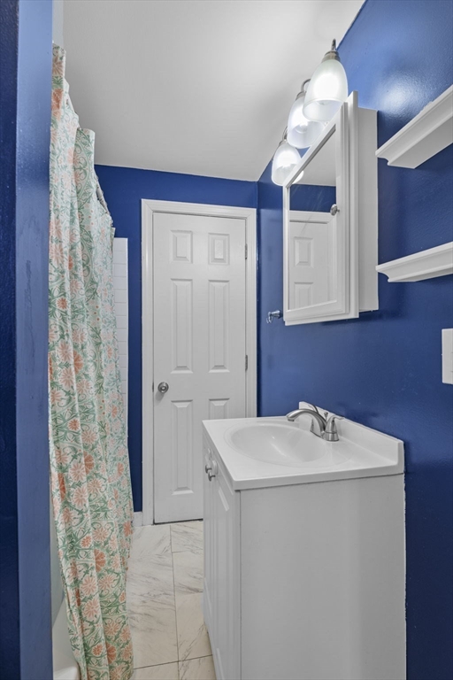 10 Stoddard Terrace Lynn, MA 01902 - Photo 12 of 40 a utility room with dryer and washer