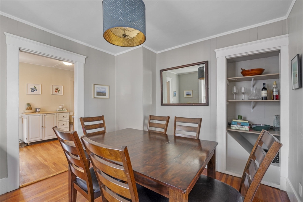 10 Stoddard Terrace Lynn, MA 01902 - Photo 13 of 40 a view of a dining room with furniture and wooden floor