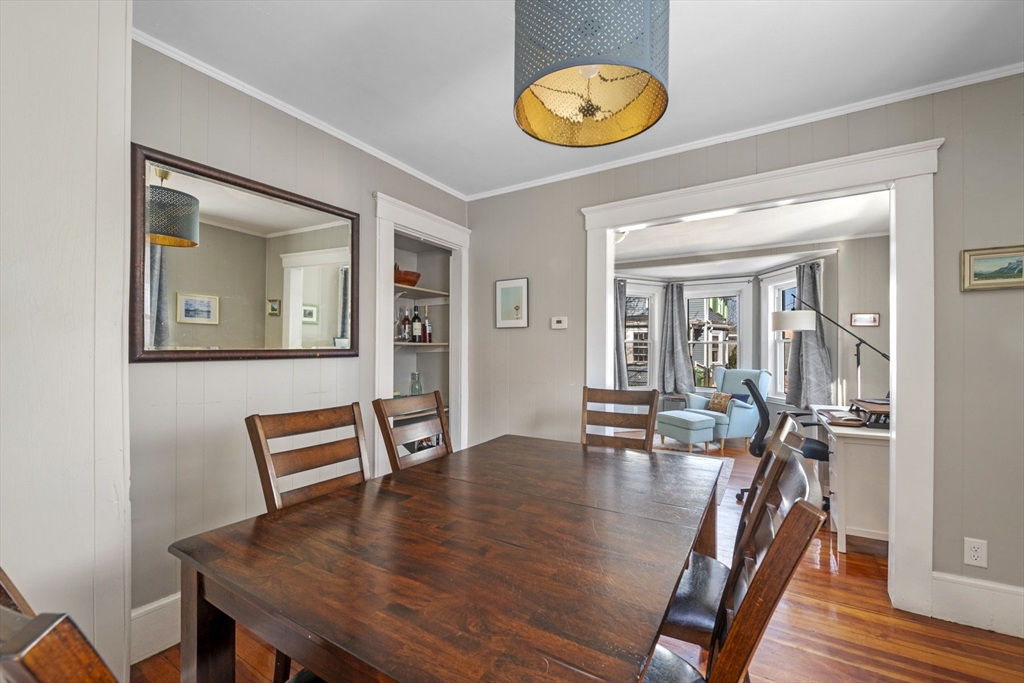 10 Stoddard Terrace Lynn, MA 01902 - Photo 15 of 40 a view of a dining room with furniture and wooden floor