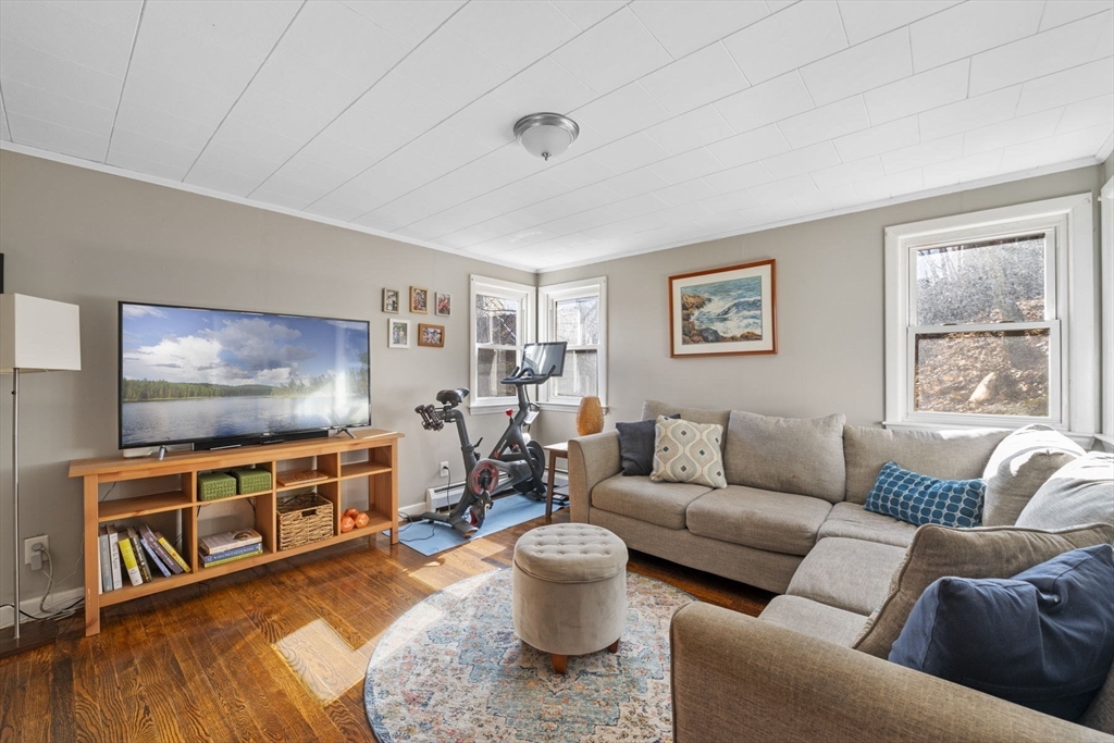 10 Stoddard Terrace Lynn, MA 01902 - Photo 2 of 40 a living room with furniture and a flat screen tv