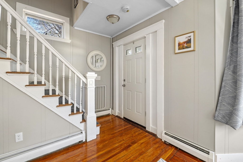 10 Stoddard Terrace Lynn, MA 01902 - Photo 21 of 40 a view of entryway with stairs and wooden floor