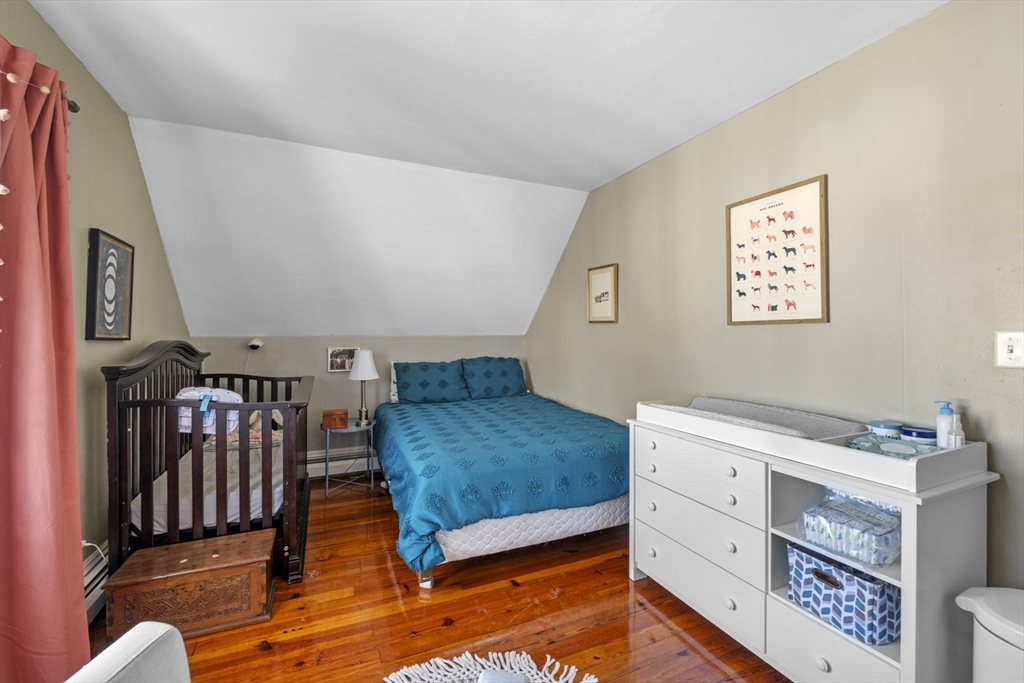 10 Stoddard Terrace Lynn, MA 01902 - Photo 28 of 40 a bedroom with furniture and a window