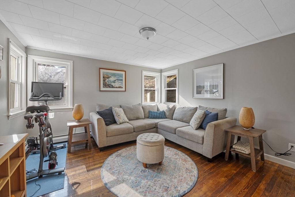 10 Stoddard Terrace Lynn, MA 01902 - Photo 3 of 40 a living room with furniture wooden floor and a window
