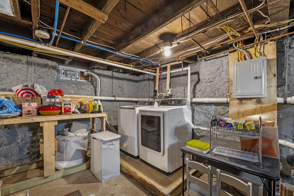 10 Stoddard Terrace Lynn, MA 01902 - Photo 36 of 40 a storage room with washer and dryer