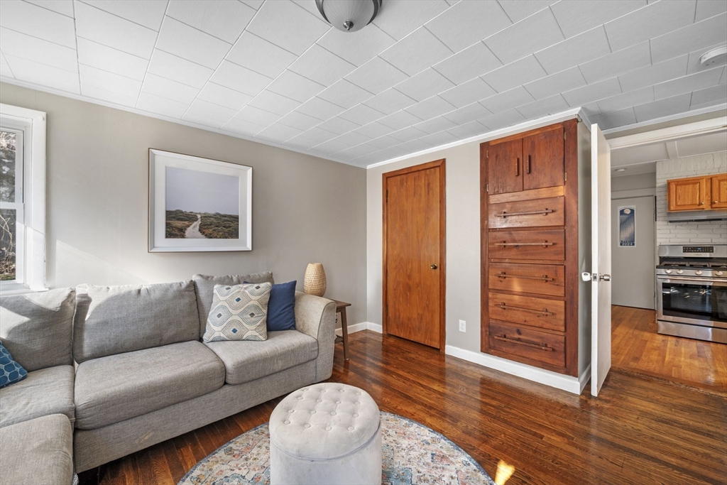 10 Stoddard Terrace Lynn, MA 01902 - Photo 4 of 40 a living room with furniture and wooden floor