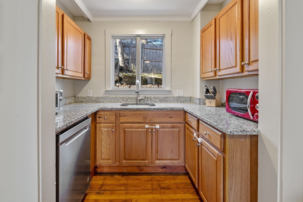 10 Stoddard Terrace Lynn, MA 01902 - Photo 6 of 40 a kitchen with stainless steel appliances granite countertop a sink and a cabinets