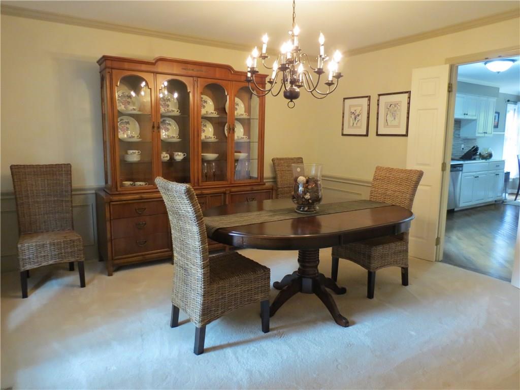 236 Sweet Gum Road Pittsburgh, PA 15238 - Photo 9 of 25 This dining room is stunning with its gorgeous chandelier. Perfect for an intimate dinner or a larger dinner party!