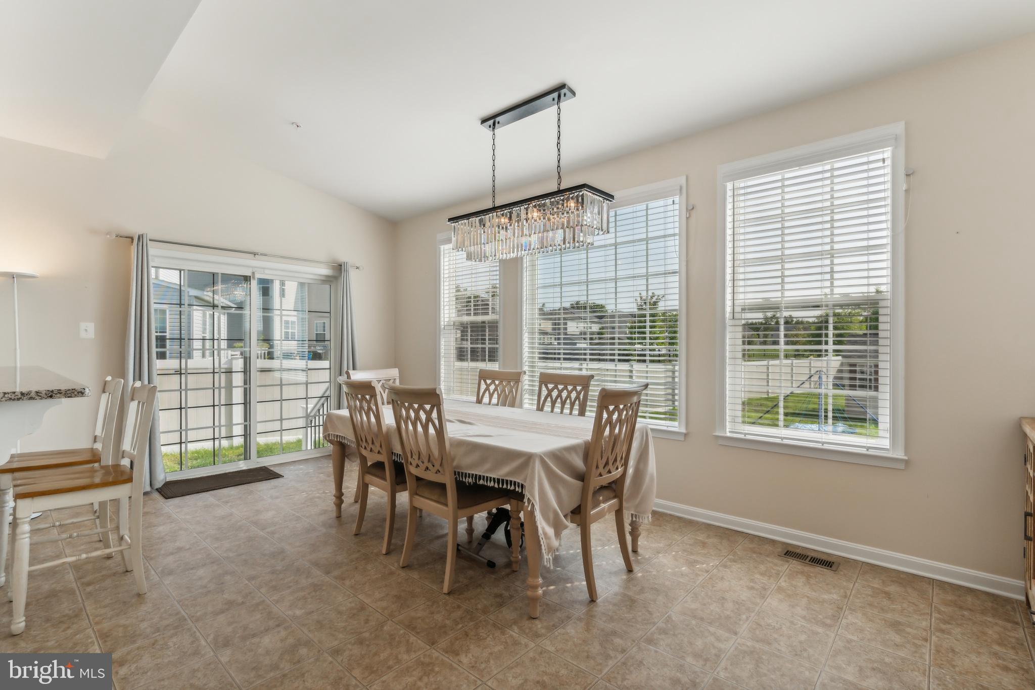 11538 Neon Road Fort Washington, MD 20744 - Photo 17 of 50 a view of a dining room with furniture window and outside view
