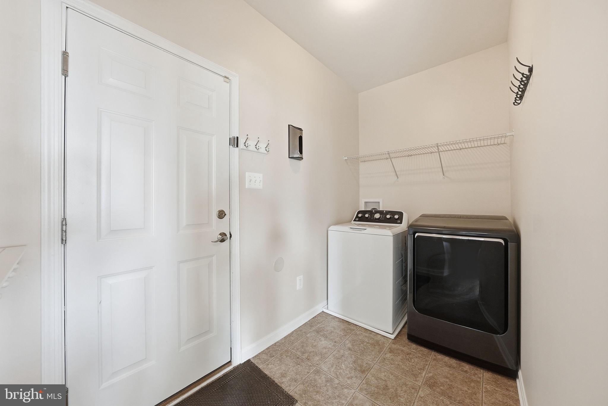 11538 Neon Road Fort Washington, MD 20744 - Photo 19 of 58 a utility room with dryer and washer