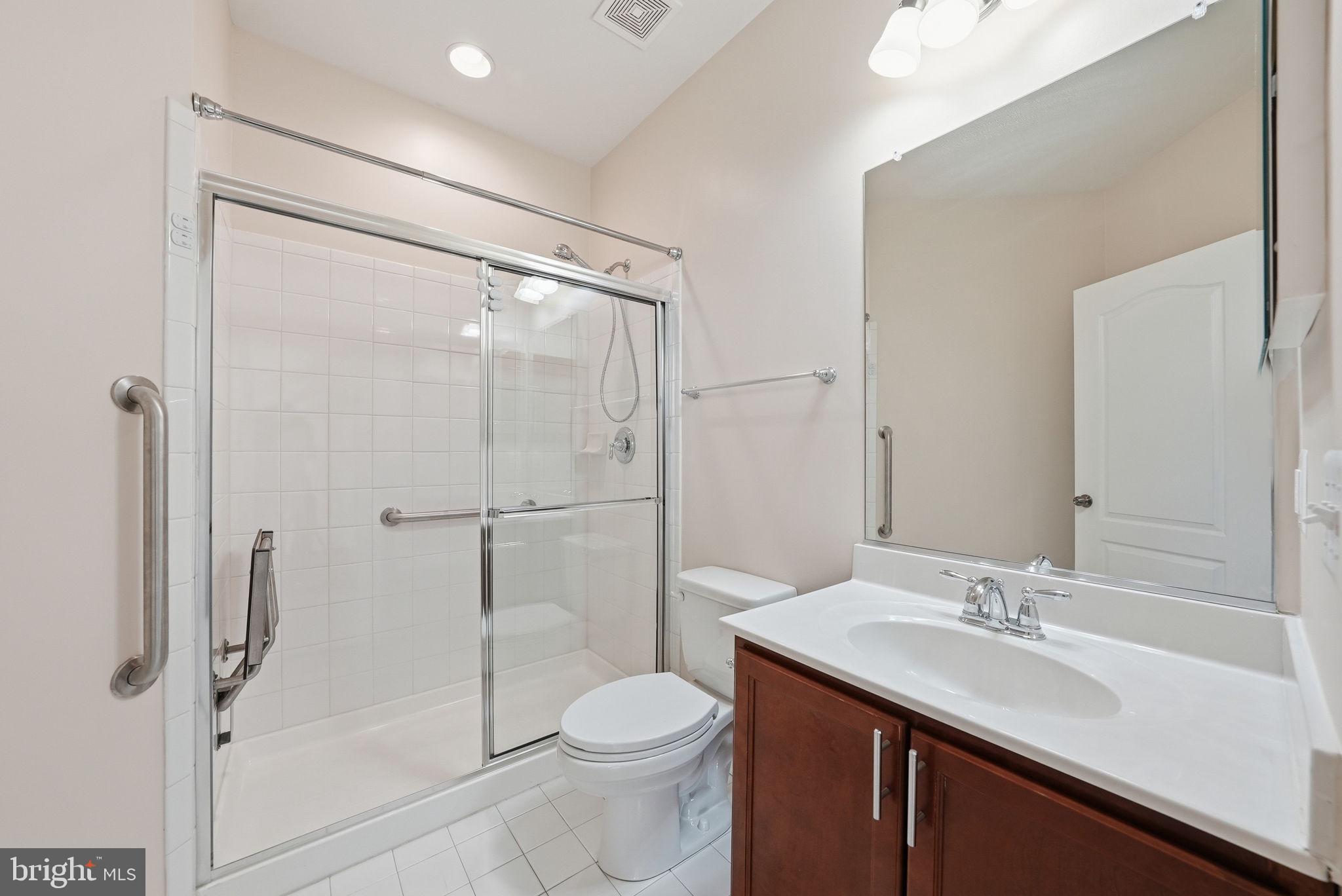 11538 Neon Road Fort Washington, MD 20744 - Photo 25 of 58 a bathroom with a sink toilet and shower