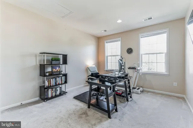 a view of a livingroom with furniture and window