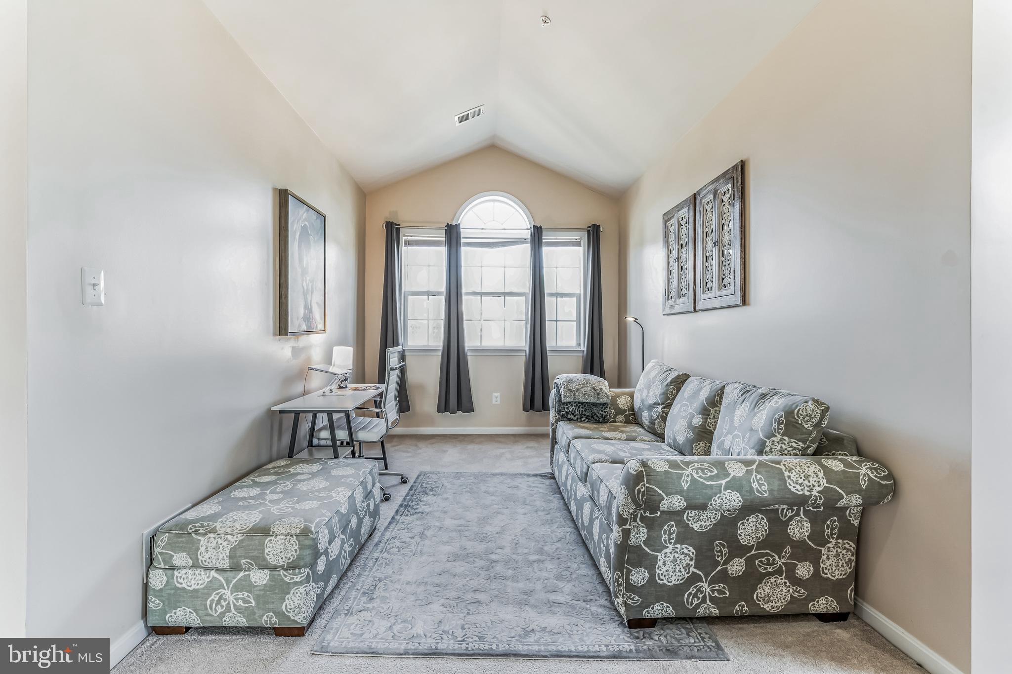 11538 Neon Road Fort Washington, MD 20744 - Photo 34 of 50 a living room with furniture and a large window