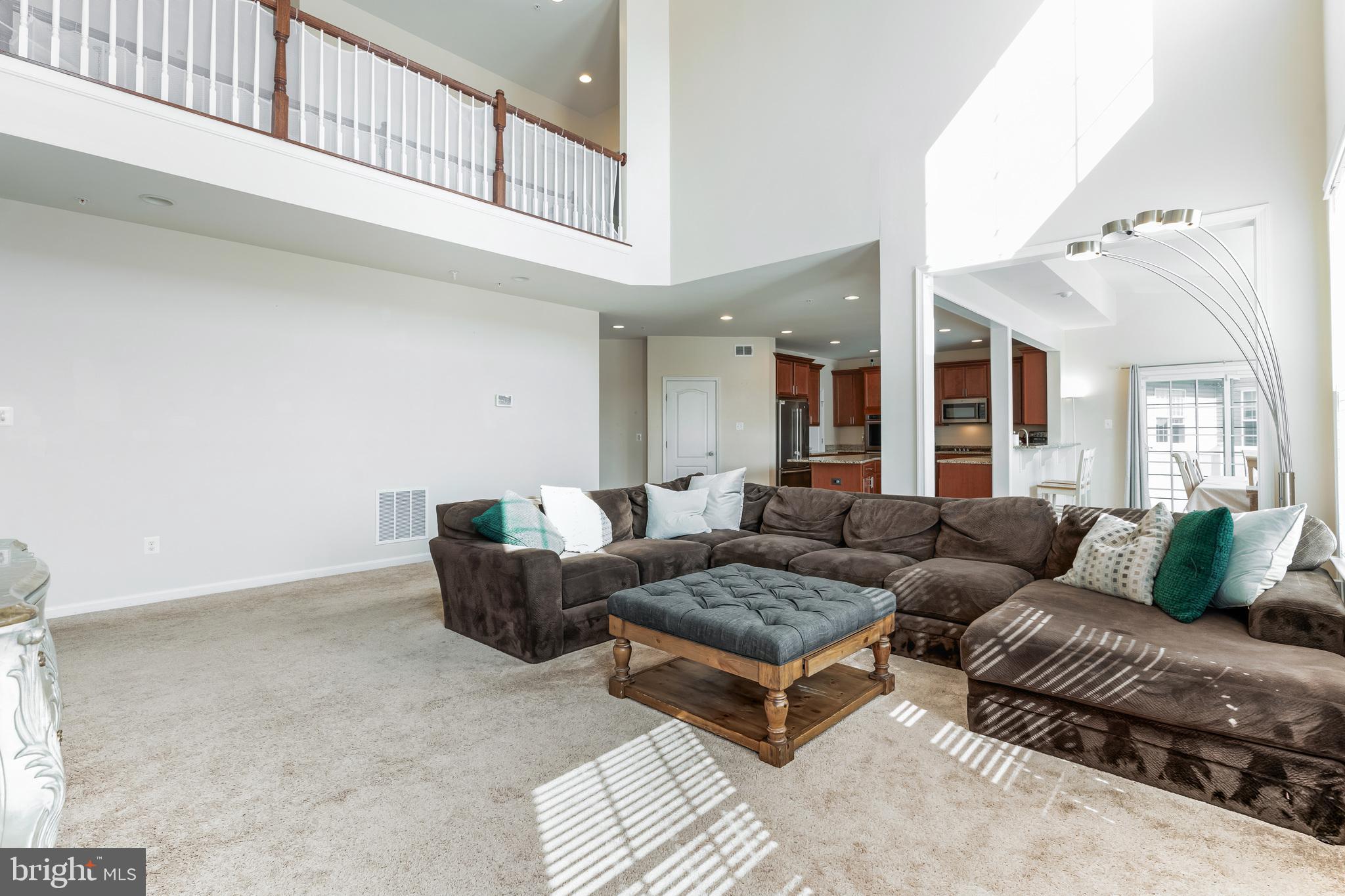11538 Neon Road Fort Washington, MD 20744 - Photo 38 of 50 a living room with furniture and a rug