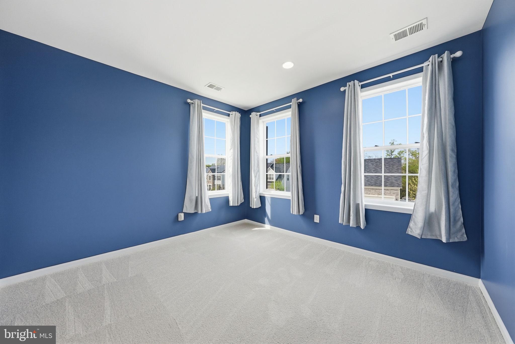 11538 Neon Road Fort Washington, MD 20744 - Photo 43 of 58 a view of empty room with wooden floor and fan