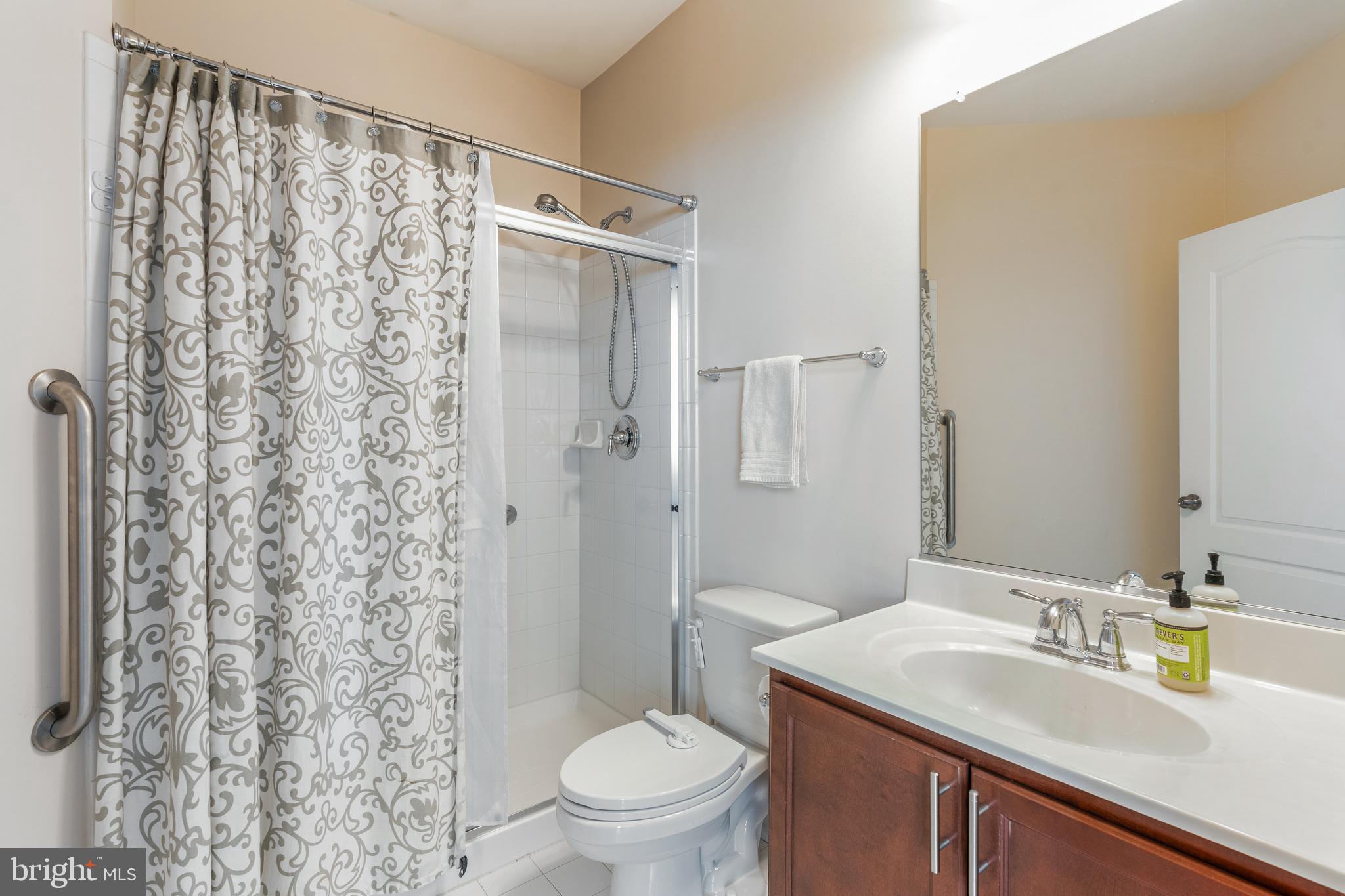 11538 Neon Road Fort Washington, MD 20744 - Photo 10 of 50 a bathroom with a sink toilet and shower