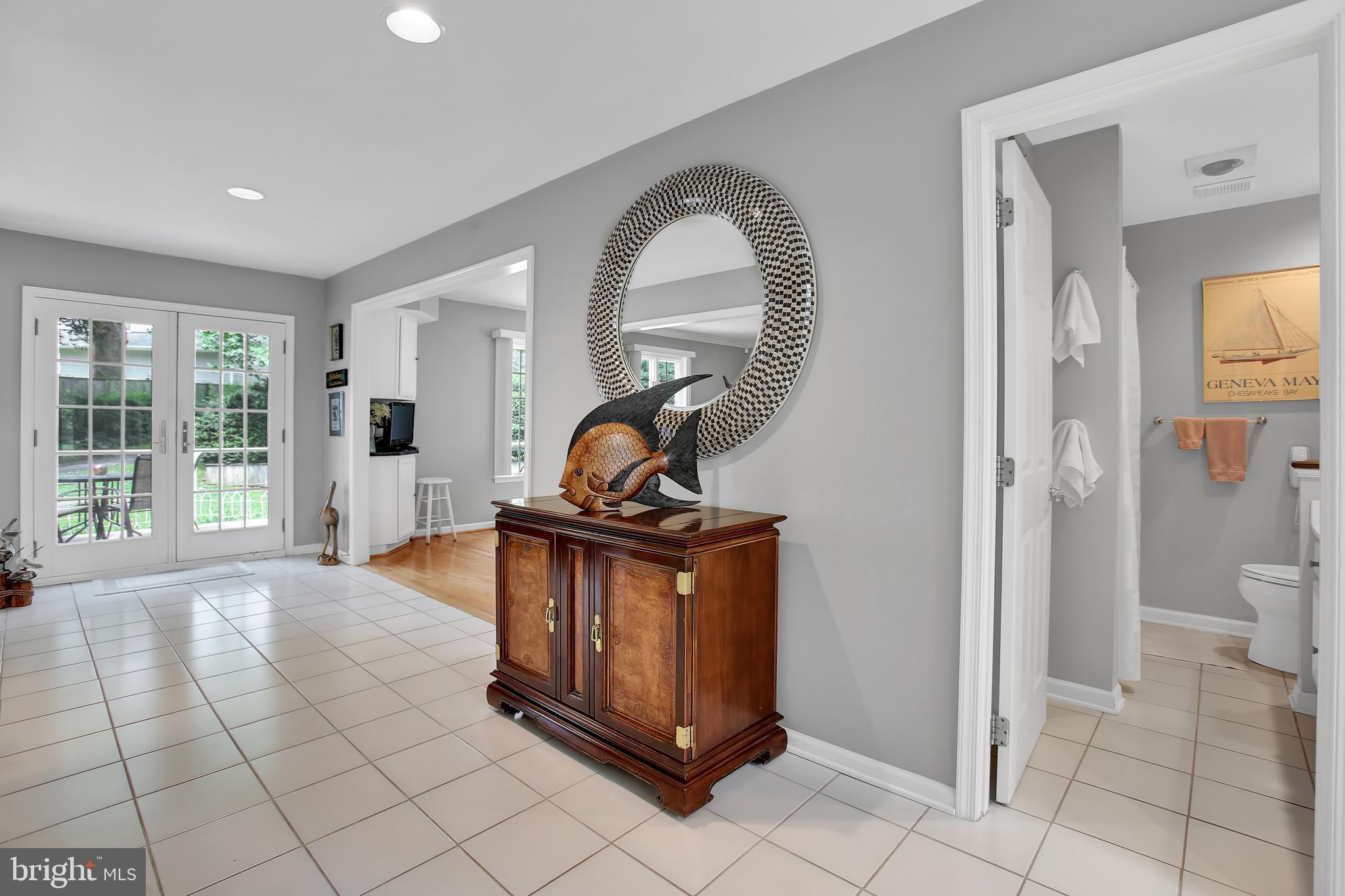 602 Amoss Road Severna Park, MD 21146 - Photo 10 of 50 Main level landing to kitchen and dining room