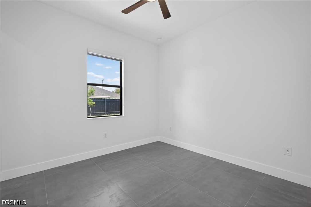 1715 Southwest 4th Street Cape Coral, FL 33991 - Photo 24 of 42 an empty room with a empty space and window