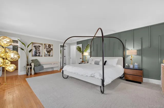 a bedroom with a bed and ceiling fan