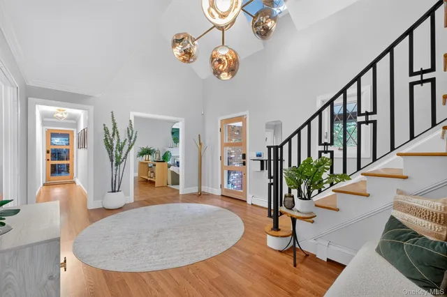 a view of an entryway and livingroom with furniture