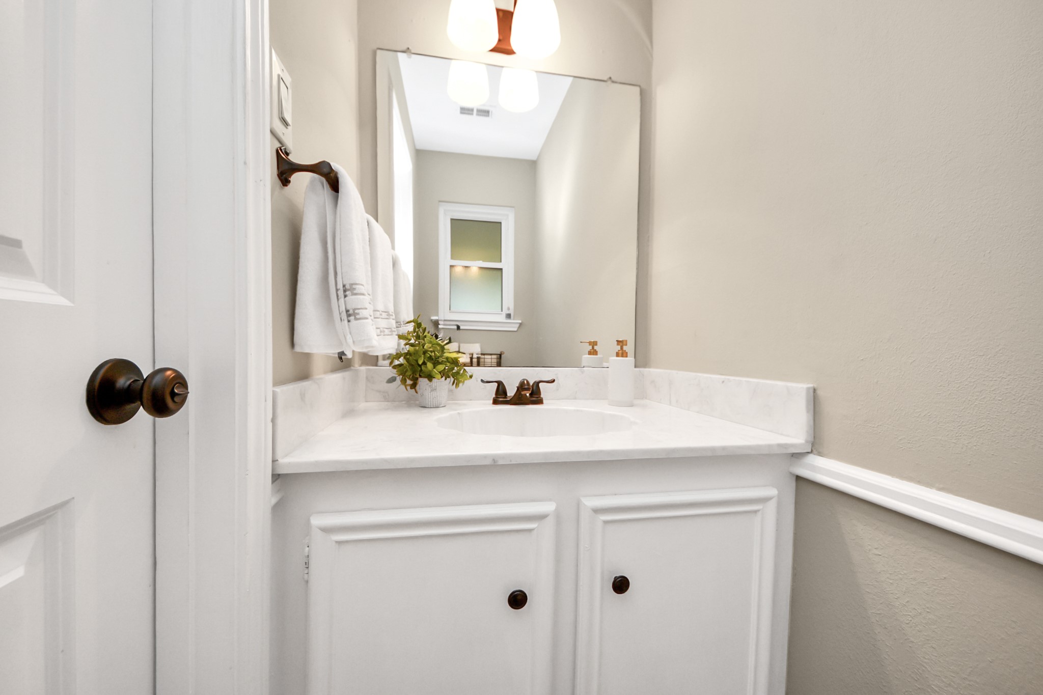 5511 Lacreek Lane Spring, TX 77379 - Photo 19 of 39 a bathroom with a sink vanity and a mirror