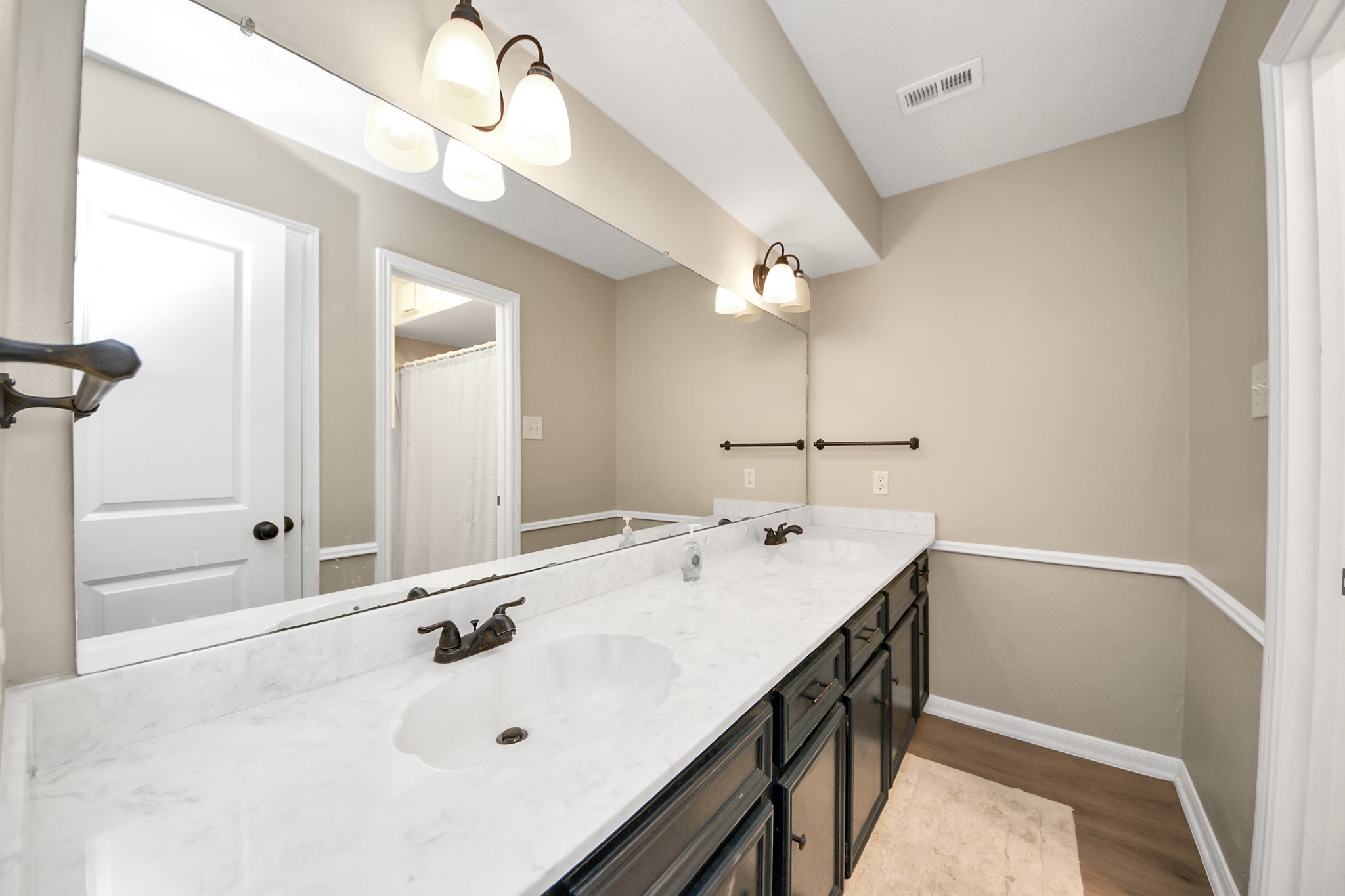 5511 Lacreek Lane Spring, TX 77379 - Photo 24 of 39 a bathroom with a double vanity sink mirror and