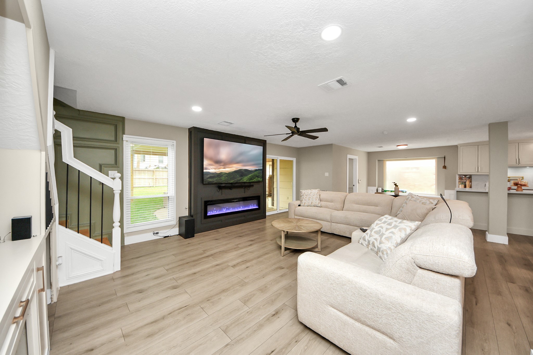 5511 Lacreek Lane Spring, TX 77379 - Photo 4 of 39 a living room with furniture and a flat screen tv