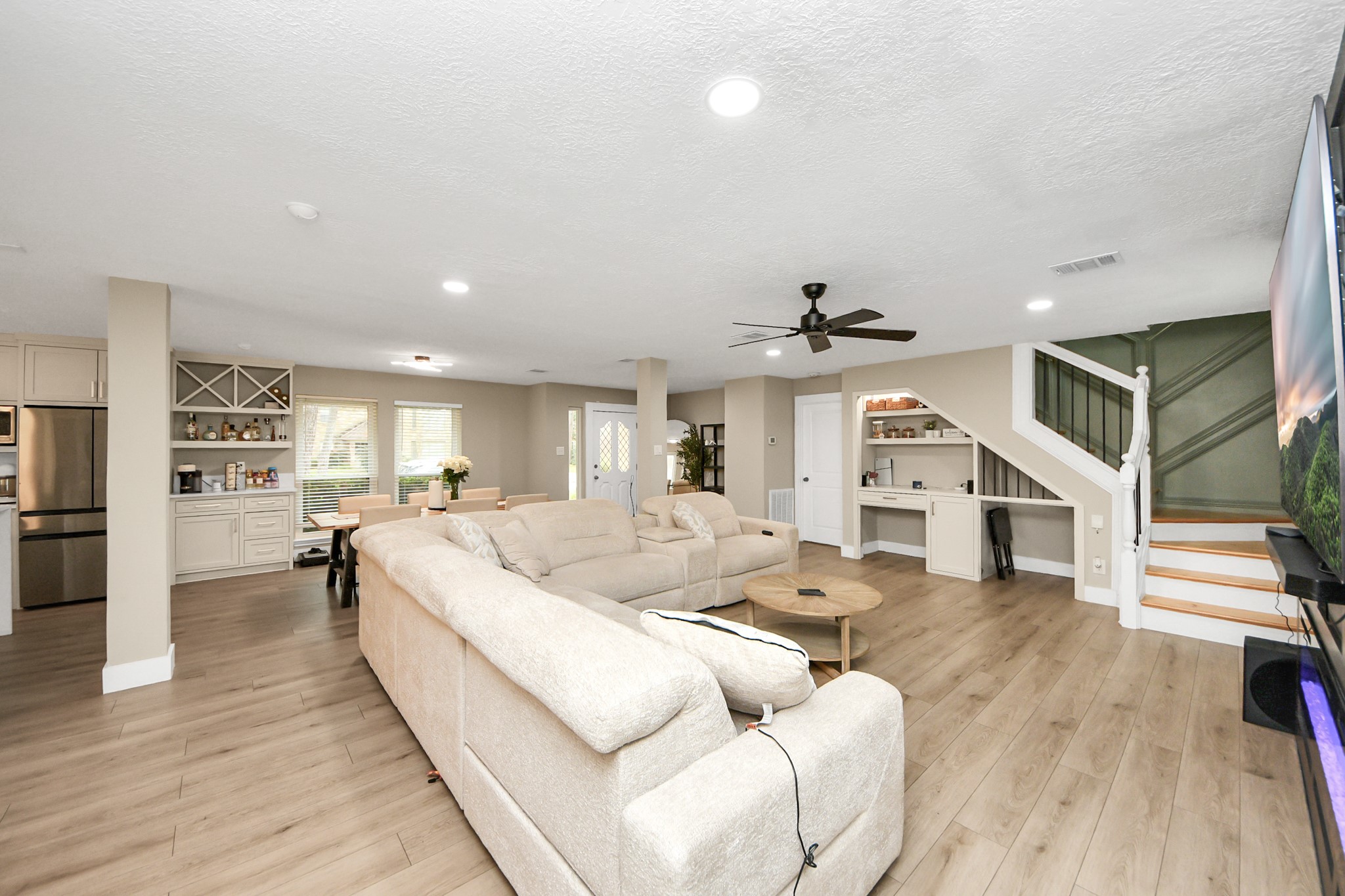 5511 Lacreek Lane Spring, TX 77379 - Photo 6 of 39 a living room with furniture and kitchen view