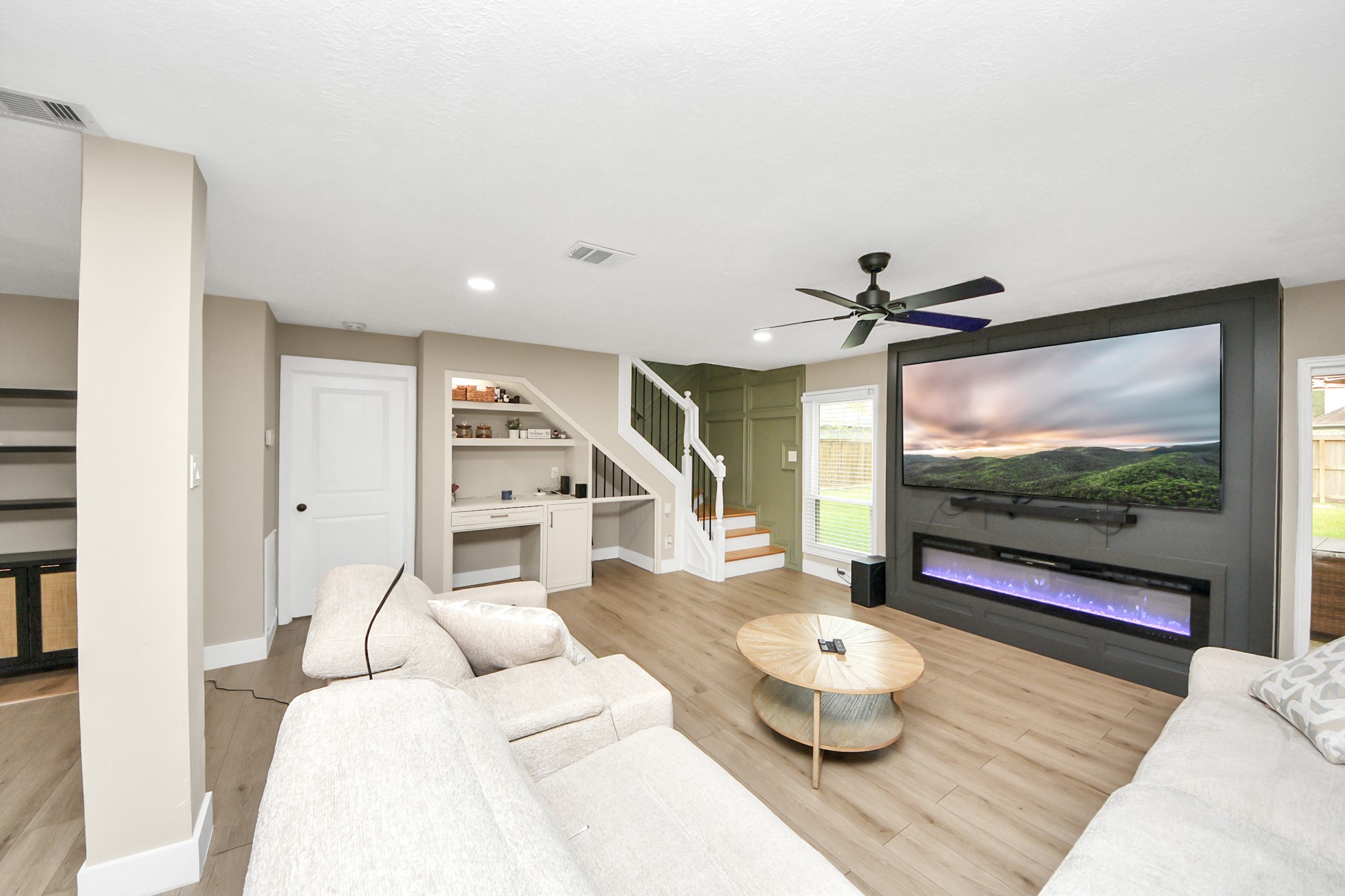 5511 Lacreek Lane Spring, TX 77379 - Photo 8 of 39 a living room with furniture and a flat screen tv