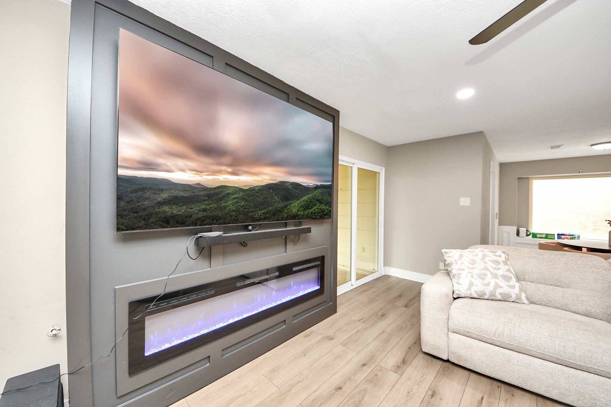 5511 Lacreek Lane Spring, TX 77379 - Photo 9 of 39 a living room with furniture and a floor to ceiling window