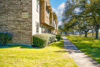 10492 Hammerly Boulevard, Unit 83 Houston, TX 77043 - Photo 6 of 30 a view of swimming pool with garden