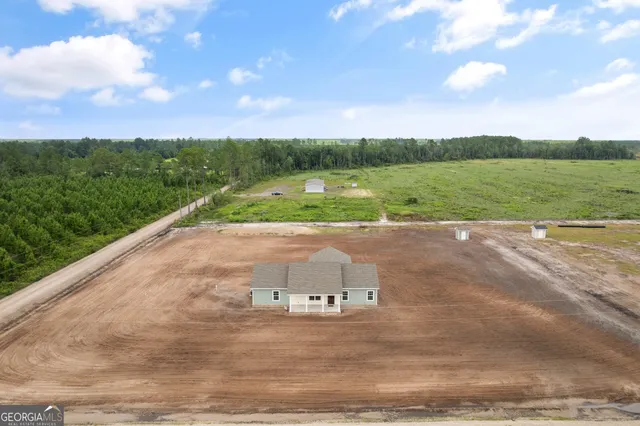 a view of a street with an ocean view