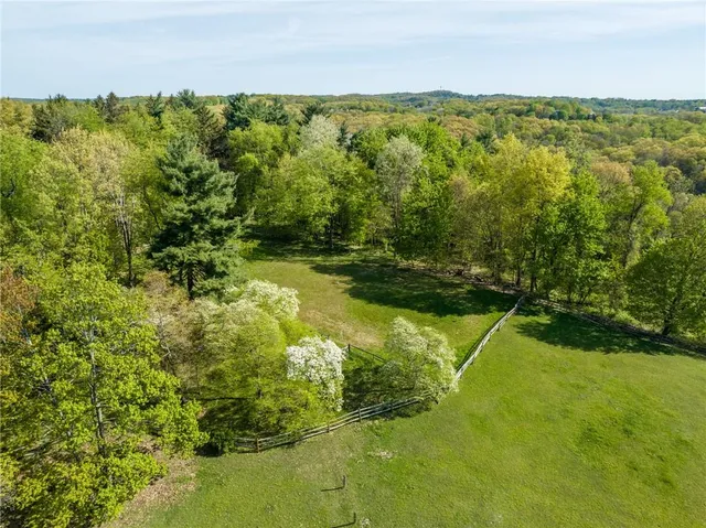 a view of a lake with a yard