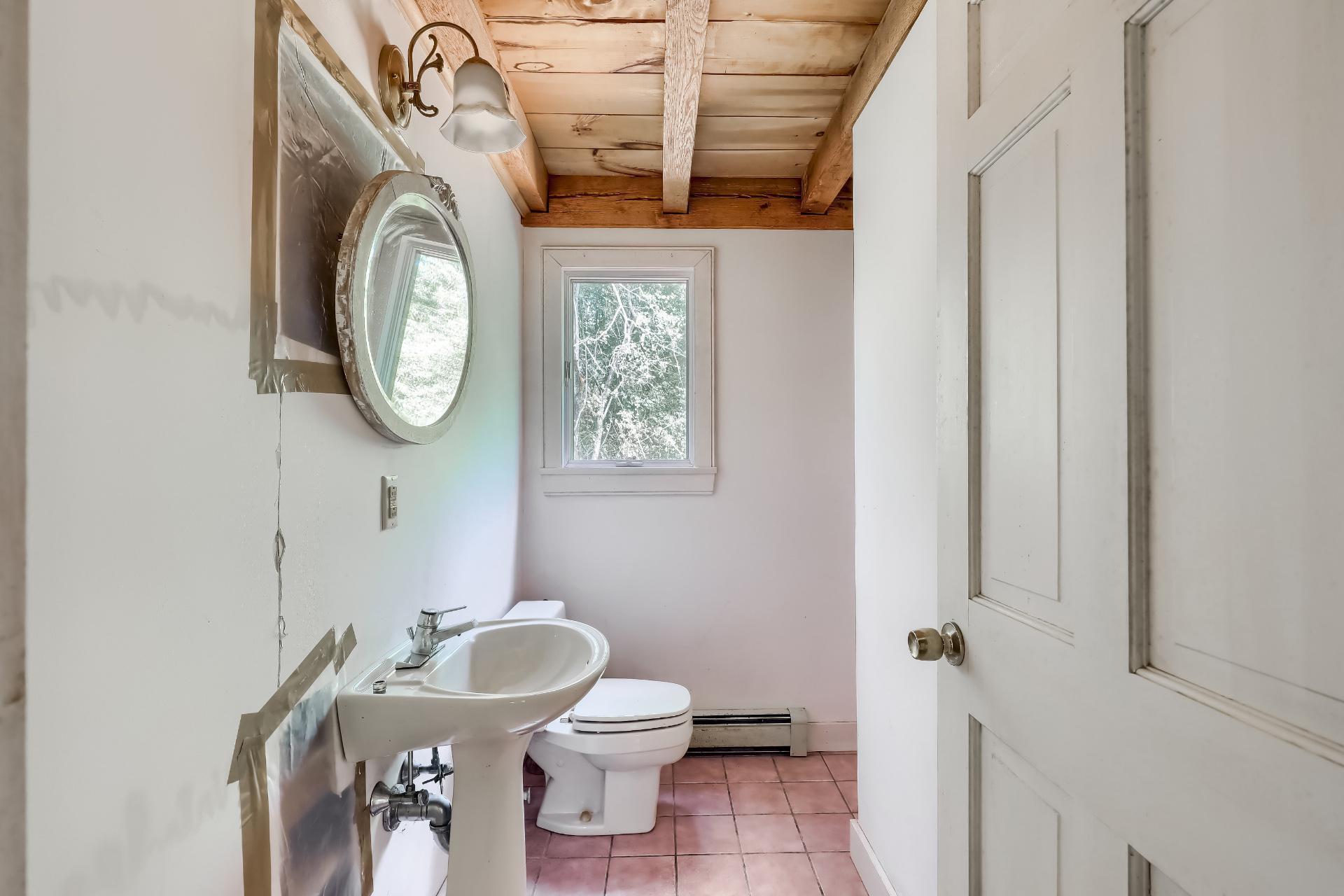 309 Great Fields Road Brewster, MA 02631 - Photo 11 of 23 a bathroom with a toilet and a sink