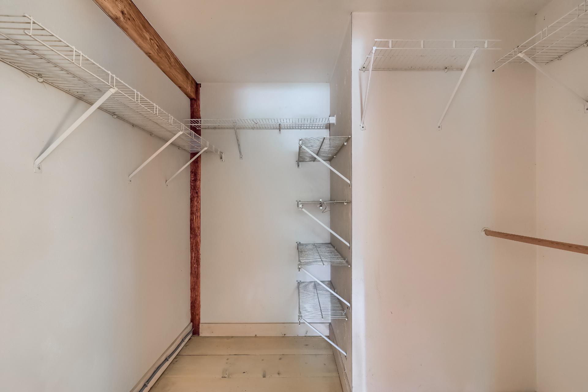 309 Great Fields Road Brewster, MA 02631 - Photo 16 of 23 a view of walk in closet with empty racks