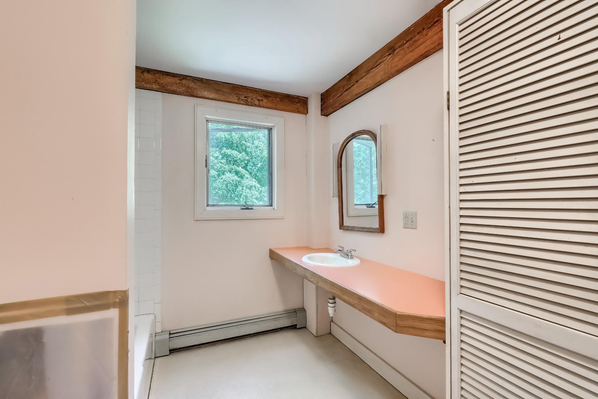 309 Great Fields Road Brewster, MA 02631 - Photo 17 of 23 a bathroom with a double vanity sink and mirror