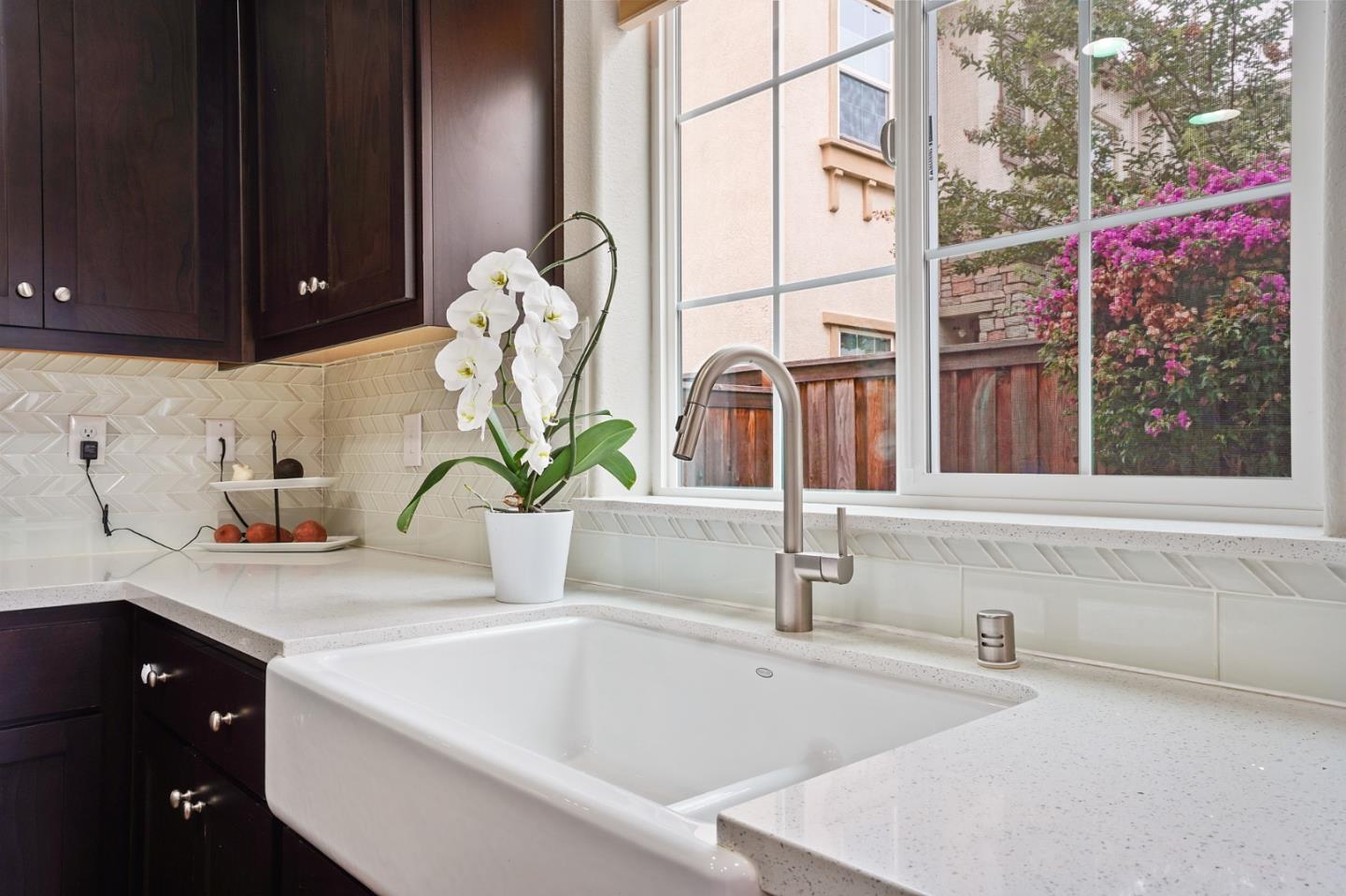1521 Middle Lane Hayward, CA 94545 - Photo 16 of 34 a bathroom with a granite countertop sink and a bathtub