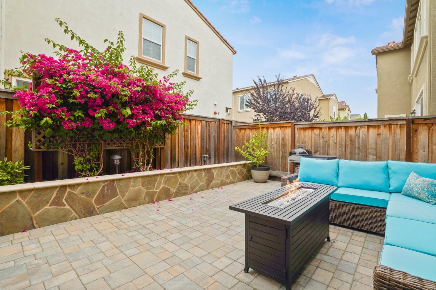 1521 Middle Lane Hayward, CA 94545 - Photo 29 of 34 a view of a chairs and tables in the back yard of the house