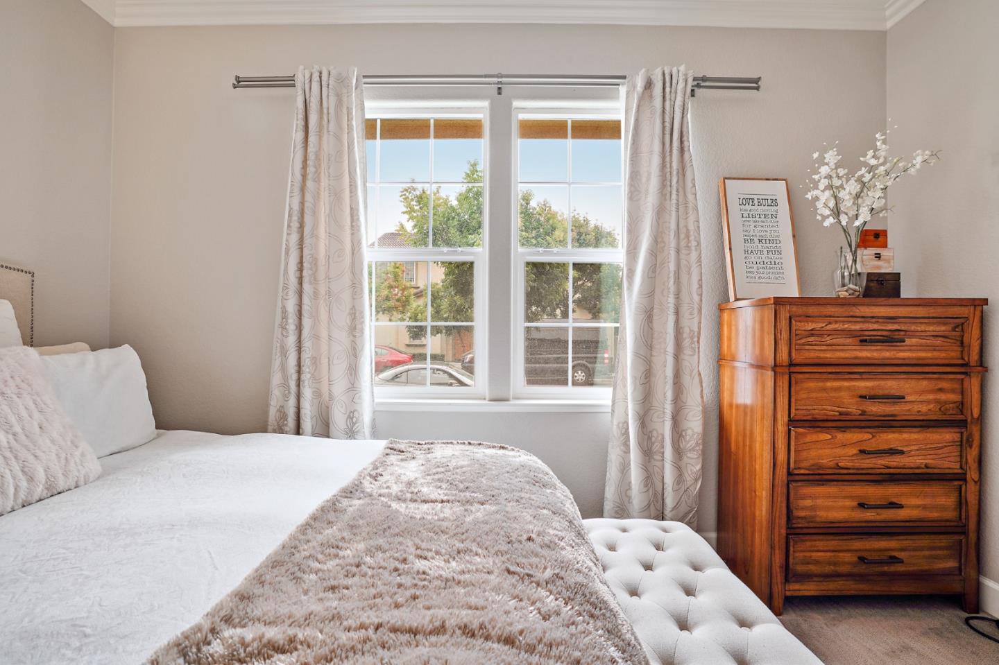 1521 Middle Lane Hayward, CA 94545 - Photo 6 of 34 a bedroom with a bed and a dresser