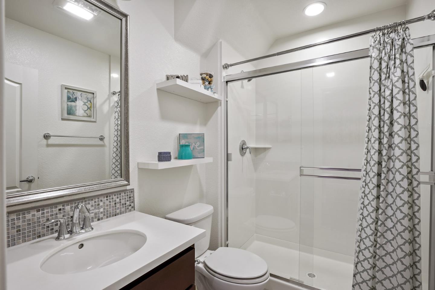 1521 Middle Lane Hayward, CA 94545 - Photo 7 of 34 a bathroom with a sink toilet and shower