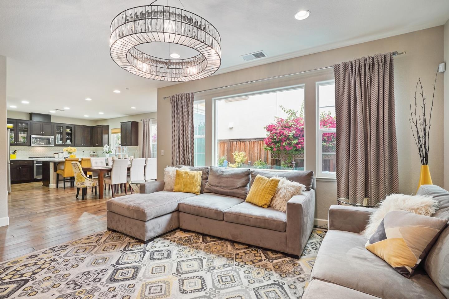 1521 Middle Lane Hayward, CA 94545 - Photo 10 of 34 a living room with furniture and a chandelier