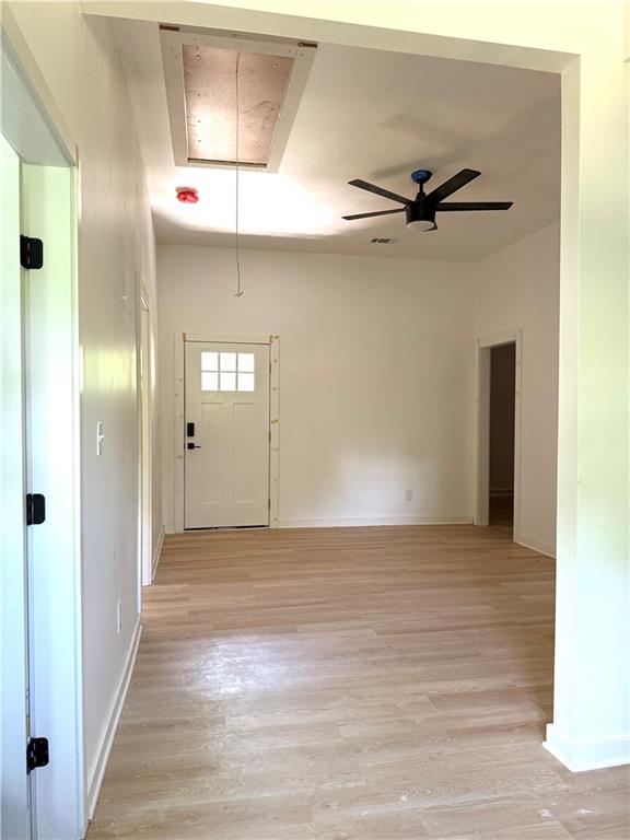 808 Center Street Macon, GA 31217 - Photo 20 of 30 a view of a hallway with a wooden shelves