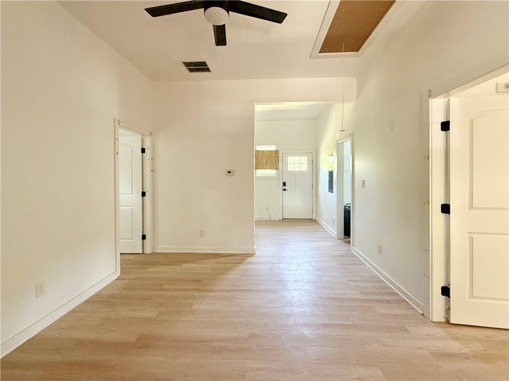 808 Center Street Macon, GA 31217 - Photo 9 of 30 a view of a hallway with wooden floor