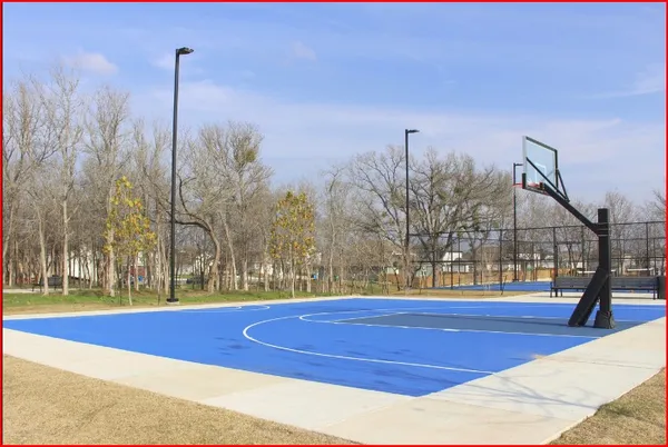 a view of a swimming pool with trees