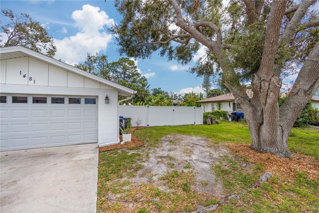 1481 Piedmont Road Venice, FL 34293 - Photo 39 of 52 16 foot wide gate to the back-yard