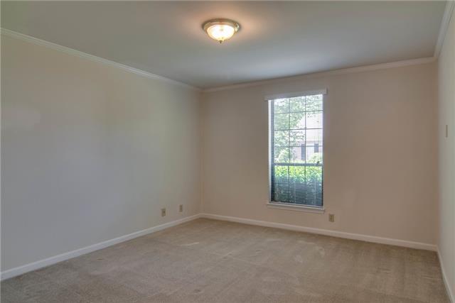 1317 General George Patton Road Nashville, TN 37221 - Photo 11 of 20 This is a downstairs bedroom that works as a Master or guest room. Full Bath off the hall. Double closet.