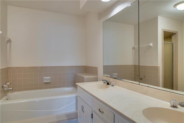 1317 General George Patton Road Nashville, TN 37221 - Photo 14 of 20 Very large master Bath with separate tub and shower. Neutral ceramic tile and double vanity