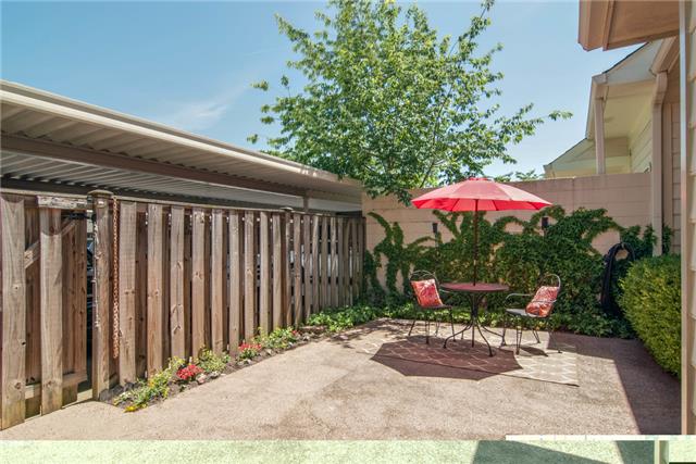 1317 General George Patton Road Nashville, TN 37221 - Photo 18 of 20 Ivy covered wall and planting bed.