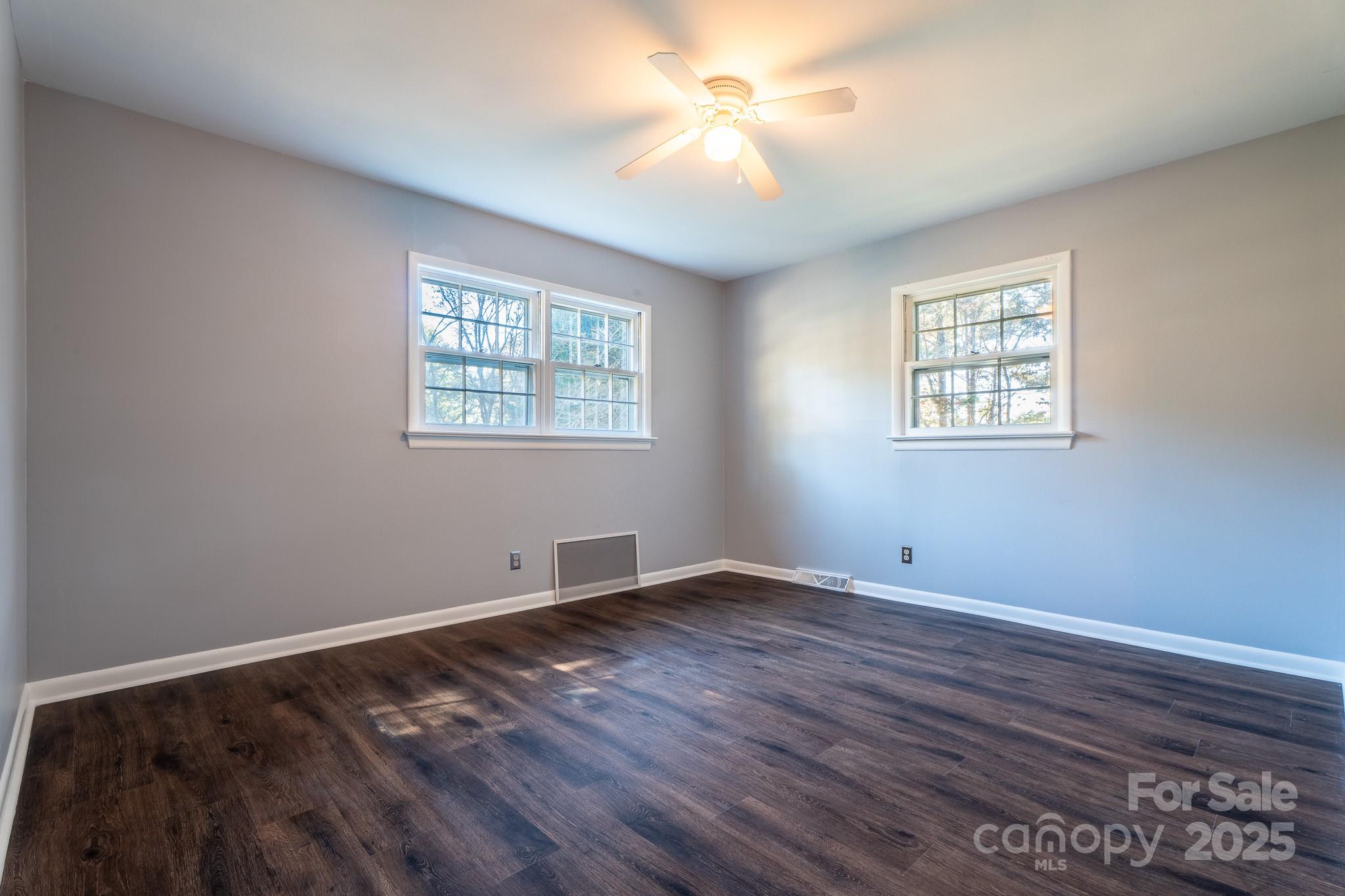 3851 Idlewood Acres Road Hickory, NC 28601 - Photo 20 of 34 a view of an empty room with window and wooden floor